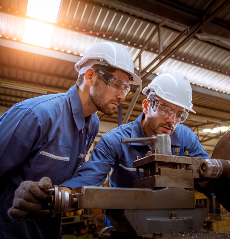 men working in machine shop